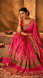 Vibrant Rani pink Silk saree with figurative motifs