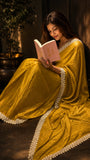 Striking Mustard yellow striped saree with lace border