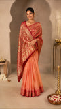 Vibrant Peach and Orange Silk Saree with golden motifs