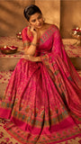 Vibrant Rani pink Silk saree with figurative motifs